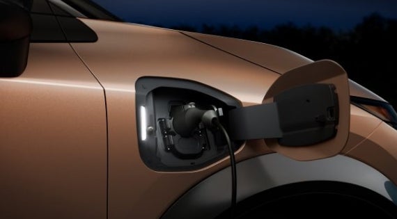 Close-up image of charging cable plugged in | Bridgewater Nissan in Bridgewater NJ